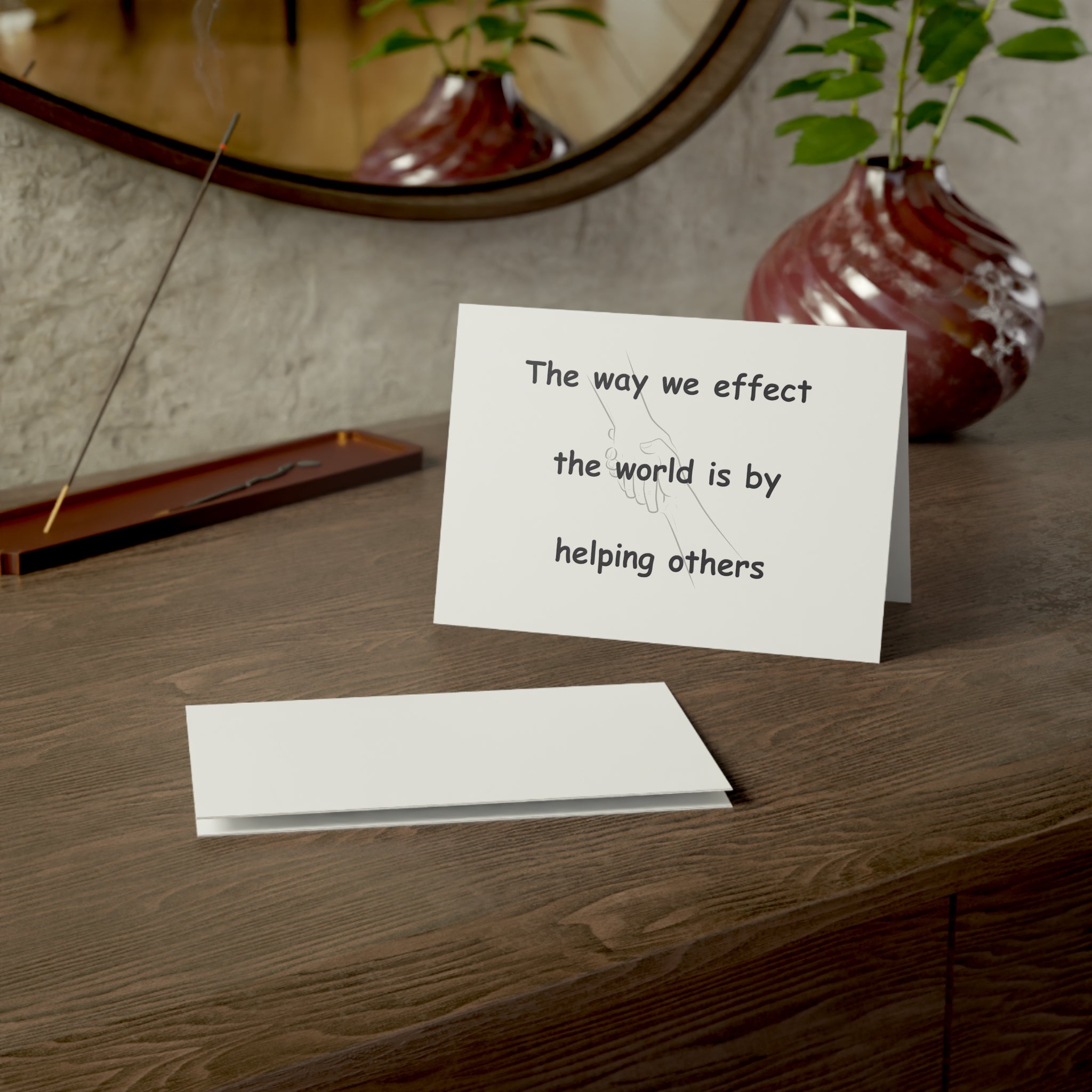 The way we effect the world is by helping others card